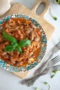 Chicken hearts in a tomato sauce