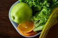 Healthy lunch prepared in small plastic container, top view, close-up. Royalty Free Stock Photo