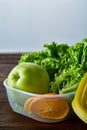 Healthy lunch prepared in small plastic container, top view, close-up. Royalty Free Stock Photo