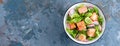 Healthy lunch salad with baked salmon fish, fresh radish, lettuce and lime. Top view. Banner Royalty Free Stock Photo