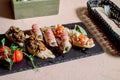 Healthy lunch snack. Stack of mexican street food fajita tortilla wraps with grilled buffalo chicken fillet and fresh vegetables, Royalty Free Stock Photo