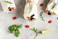 Healthy lunch snack. Three vegan tortilla wraps, rolls sandwiches with vegetable, green salad mix, lime and chili pepper