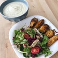 Healthy meal salad and chicken wings