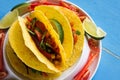 Mexican Tacos with Ground Beef and Vegetables on Rustic Blue Background Royalty Free Stock Photo