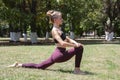 Healthy middle aged woman doing fitness stretching outdoors Royalty Free Stock Photo