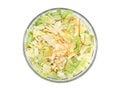 Healthy mixed white salad in a transparent bowl. The vegetables are iceberg lettuce,fennel, green lettuce, and julienne carrots.