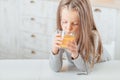 Healthy morning beverage girl drinking fruit juice Royalty Free Stock Photo