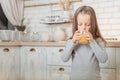 Healthy morning beverage girl drinking fruit juice Royalty Free Stock Photo