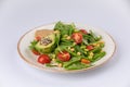 Healthy natural food. Salad with green vegetables, vitamins on the plate Royalty Free Stock Photo