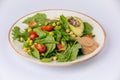 Healthy natural food. Salad with green vegetables, vitamins on the plate Royalty Free Stock Photo