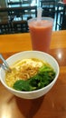 Healthy noodles and guava juice on the caffe table