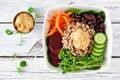 Healthy nourishment bowl on a white wood background