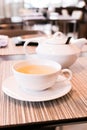 Green herbal tea in a restaurant, five o\'clock