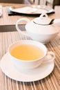 Green herbal tea in a restaurant, five o\'clock