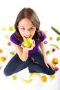 Healthy nutrition - young woman with fruits