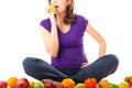 Healthy nutrition - young woman with fruits