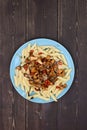 Healthy nutritious meal with forest mushrooms. Pasta penne with Royalty Free Stock Photo