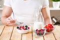 Healthy and nutritious yogurt with cereal and fresh raw berries Royalty Free Stock Photo