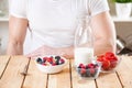 Healthy and nutritious yogurt with cereal and fresh raw berries Royalty Free Stock Photo