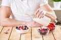 Healthy and nutritious yogurt with cereal and fresh raw berries Royalty Free Stock Photo