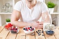 Healthy and nutritious yogurt with cereal and fresh raw berries Royalty Free Stock Photo