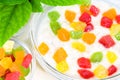 Healthy oatmeal close-up with colorful candied fruit