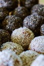 Healthy oats balls with chia seeds and coconut toppings.