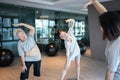 Healthy old elderly exercise with her asian family,happy mother daughter and senior grandmother doing yoga exercise,practicing