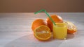 Healthy orange juice in a glass and oranges. Juice splash slow motion footage. Advetising shot. Advert