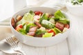 Healthy Organic BLT Bacon Salad with Lettuce and Tomato closeup on the plate. Horizontal Royalty Free Stock Photo