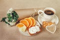 Healthy Organic Breakfast.Cup og Coffee,Cut Orange,Biscuit with Cottage Cheese.Wish Card with Flowers. Royalty Free Stock Photo