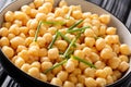 Healthy organic chickpea food with green onions close-up in a bowl. horizontal Royalty Free Stock Photo