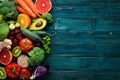Healthy organic food on a blue wooden background. Vegetables and fruits. Royalty Free Stock Photo