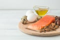 Healthy organic food. Products with healthy fats. Omega 3 omega 6. Ingredients and products: trout salmon olive oil avocado nuts