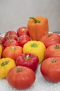 Healthy organic food: a variety of bell peppers andred tomatoes.