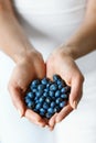 Healthy Organic Food. Woman Hands Full Of Sweet Ripe Blueberries Royalty Free Stock Photo