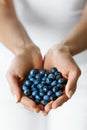 Healthy Organic Food. Woman Hands Full Of Sweet Ripe Blueberries Royalty Free Stock Photo