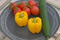 Healthy organic food yellow bell pepper, red tomatoes and cucumber Royalty Free Stock Photo