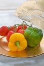 Healthy organic food yellow and green bell pepper, red tomatoes Royalty Free Stock Photo