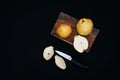 Healthy organic yellow pears on the desk. Fruit background. Ripe fresh organic pears on black background. Pear autumn harvest. Sli