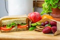 Healthy packed lunch using authentic real homemade sandwich and fresh food packed in recyclable paper sandwich bags, plastic free