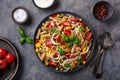 Healthy pasta salad with zucchini sweet corn tomato and basil, vegetarian lunch Royalty Free Stock Photo