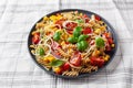 Healthy pasta salad with zucchini sweet corn tomato and basil, vegetarian lunch Royalty Free Stock Photo