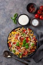 healthy pasta salad with zucchini sweet corn tomato and basil, vegetarian lunch Royalty Free Stock Photo