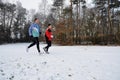 Healthy people running in the snow