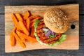Healthy, plant based burger with sweet potato fries, top view Royalty Free Stock Photo