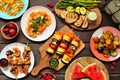 Healthy plant based summer bbq table scene on a dark wood background Royalty Free Stock Photo