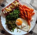 Healthy plate with broccoli, carrots and cauliflower.