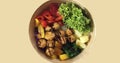 Healthy poke bowl dish with meatballs, vegetables, cabbage, pineapple, seaweed and rice in craft paper packaging. Fitness meal