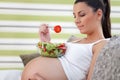 Healthy pregnancy eating salad Royalty Free Stock Photo